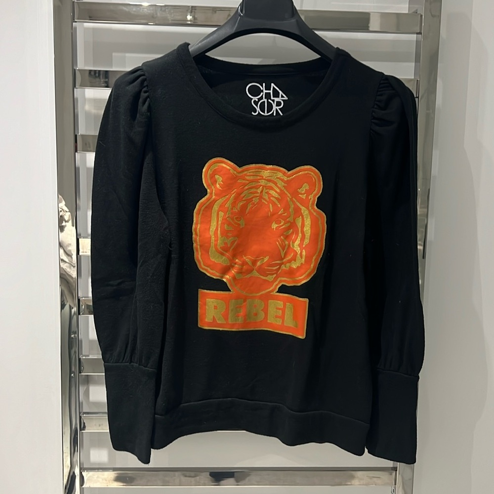 Grey sweatshirt puffy sleeves orange lion on front with good trim